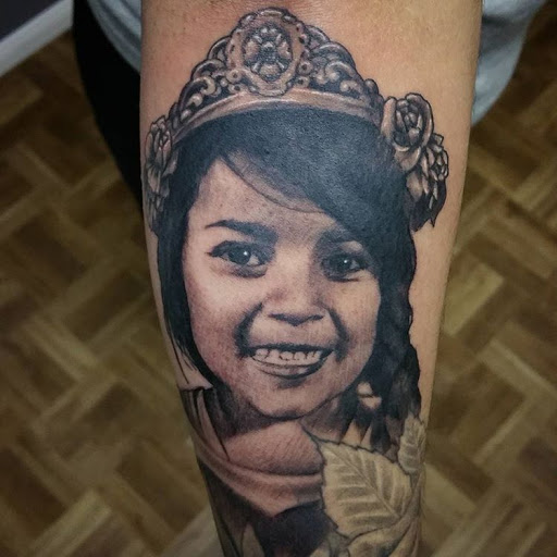 Explore dirt bike tattoo ideas, creative tattoo ideas in Oxnard, available at Downtown Tattoo & Body Piercing