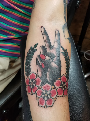 Explore flower leg tattoo ideas, creative tattoo ideas in Dallas, available at Lamar Street Tattoo Club