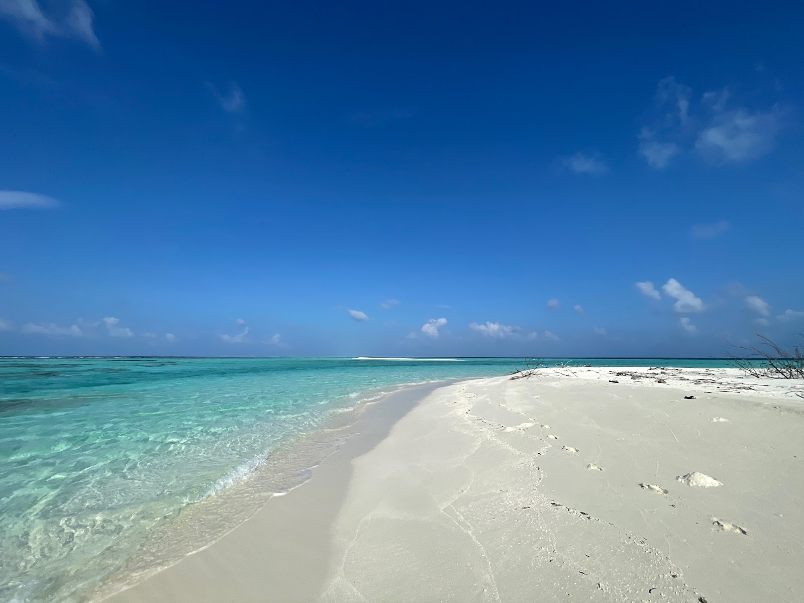Foto van Munyafushi Beach met ruim strand