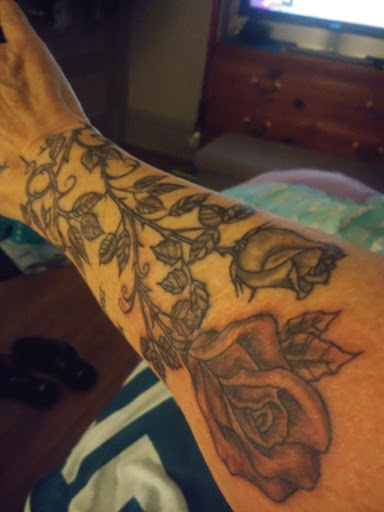 Tattoo Shop «Skin of A Different Color», reviews and photos, 2080 E New York St, Aurora, IL 60502, USA