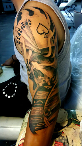 Explore black and white tattoo ideas, creative tattoo ideas in Waipahu, available at Inkflicted Tattoo