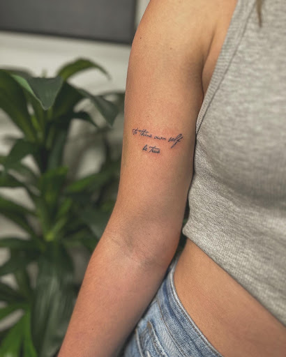 Explore female elbow tattoo ideas, creative tattoo ideas in New Philadelphia, available at Divine Ink Studio