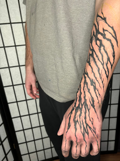 Explore half sleeve mens tattoo ideas, creative tattoo ideas in Barre, available at HINTERLAND TATTOO