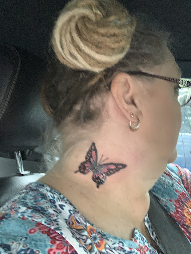 Explore minimalist tattoo ideas for men, creative tattoo ideas in Ocoee, available at Slaughterized Ink Tattoo and Piercing Studio