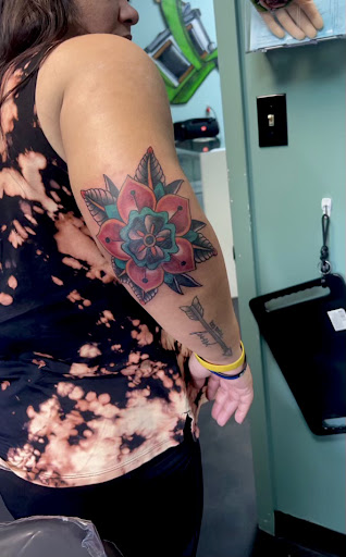 Explore small tattoo ideas behind the ear, creative tattoo ideas in Meridian, available at Creative Pain Tattoo Studio