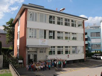 Montessori Schule: Tagesschule Blüemlisalp - Kindergarten- Vorschule und Primarschule