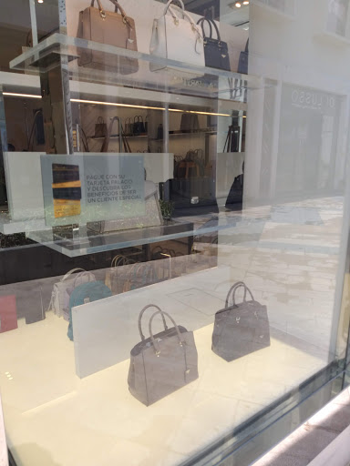 Stores to buy adolfo dominguez handbags Cancun