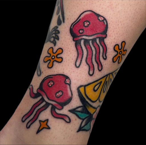 Explore legs tattoo ideas, creative tattoo ideas in Johnson City, available at Gold Cross Tattoo Co.