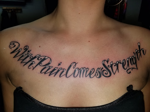 Explore mens behind the ear tattoo ideas, creative tattoo ideas in Prince Frederick, available at Red Octopus Tattoos
