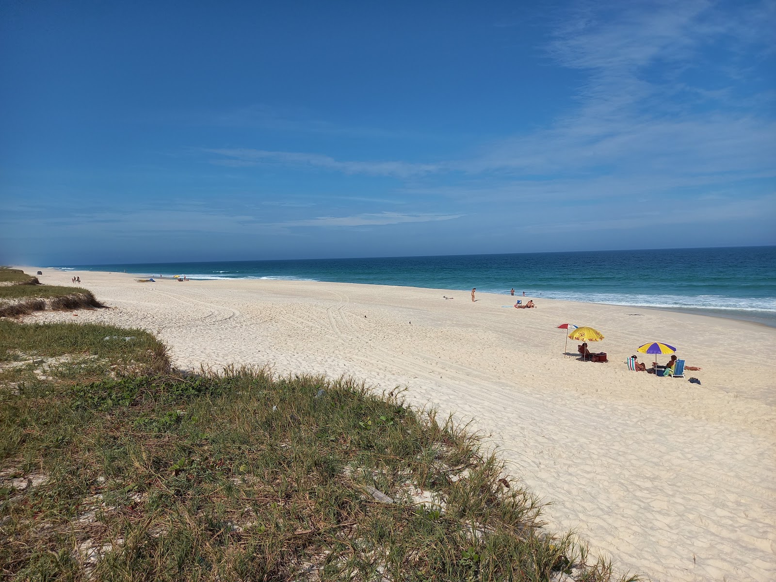 Foto von Praia do Dentinho mit lange, gerade küste