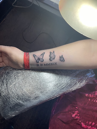 Explore roman numeral date tattoo ideas, creative tattoo ideas in Ocala, available at Beauty in a Canvas Tattoo and Art Gallery