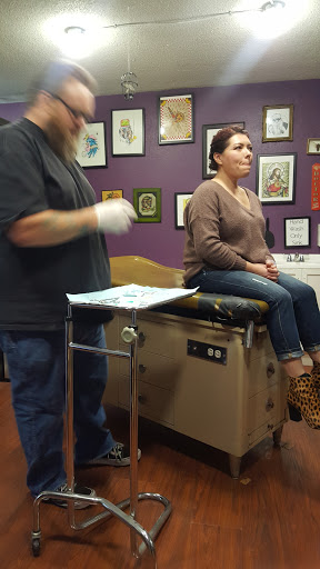 Explore astronomical tattoo ideas, creative tattoo ideas in Orange, available at The Piercing Shop