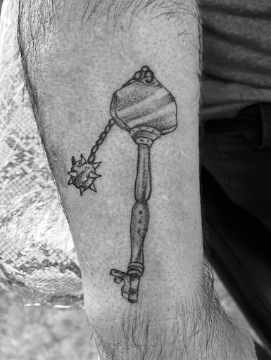 Explore godson tattoo ideas, creative tattoo ideas in Seymour, available at American Gypsy Tattoo Corp.