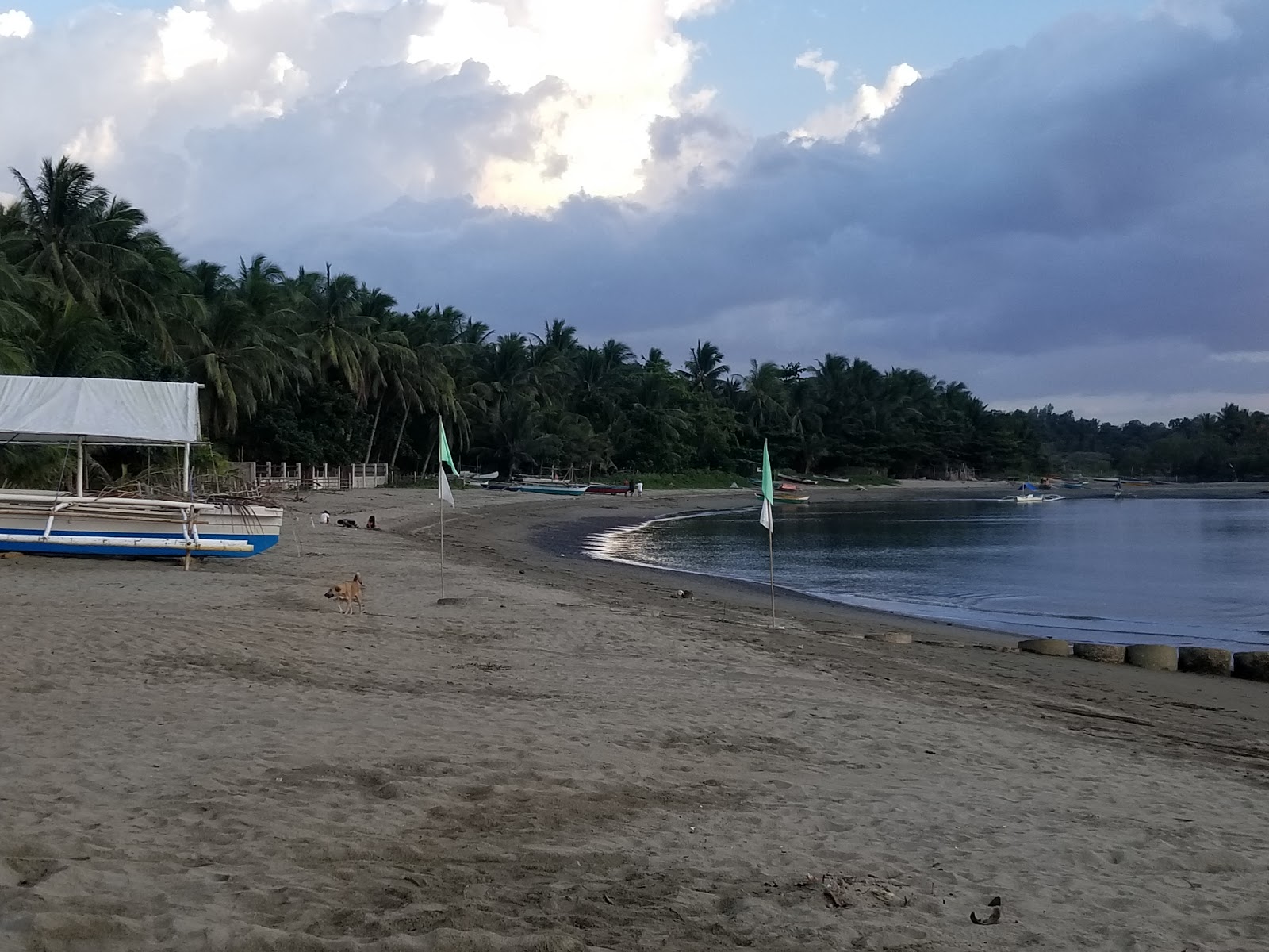 Foto di Nabulao Beach con una superficie del sabbia beige