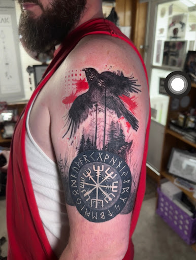 Explore throat tattoo ideas for males, creative tattoo ideas in Moweaqua, available at Fleshwound Tattoo