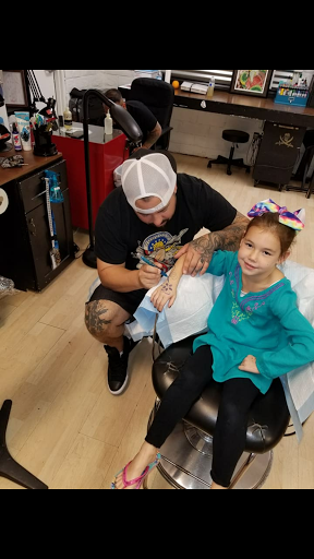 Explore red cardinal tattoo ideas, creative tattoo ideas in Sacramento, available at 13 MAG TATTOO