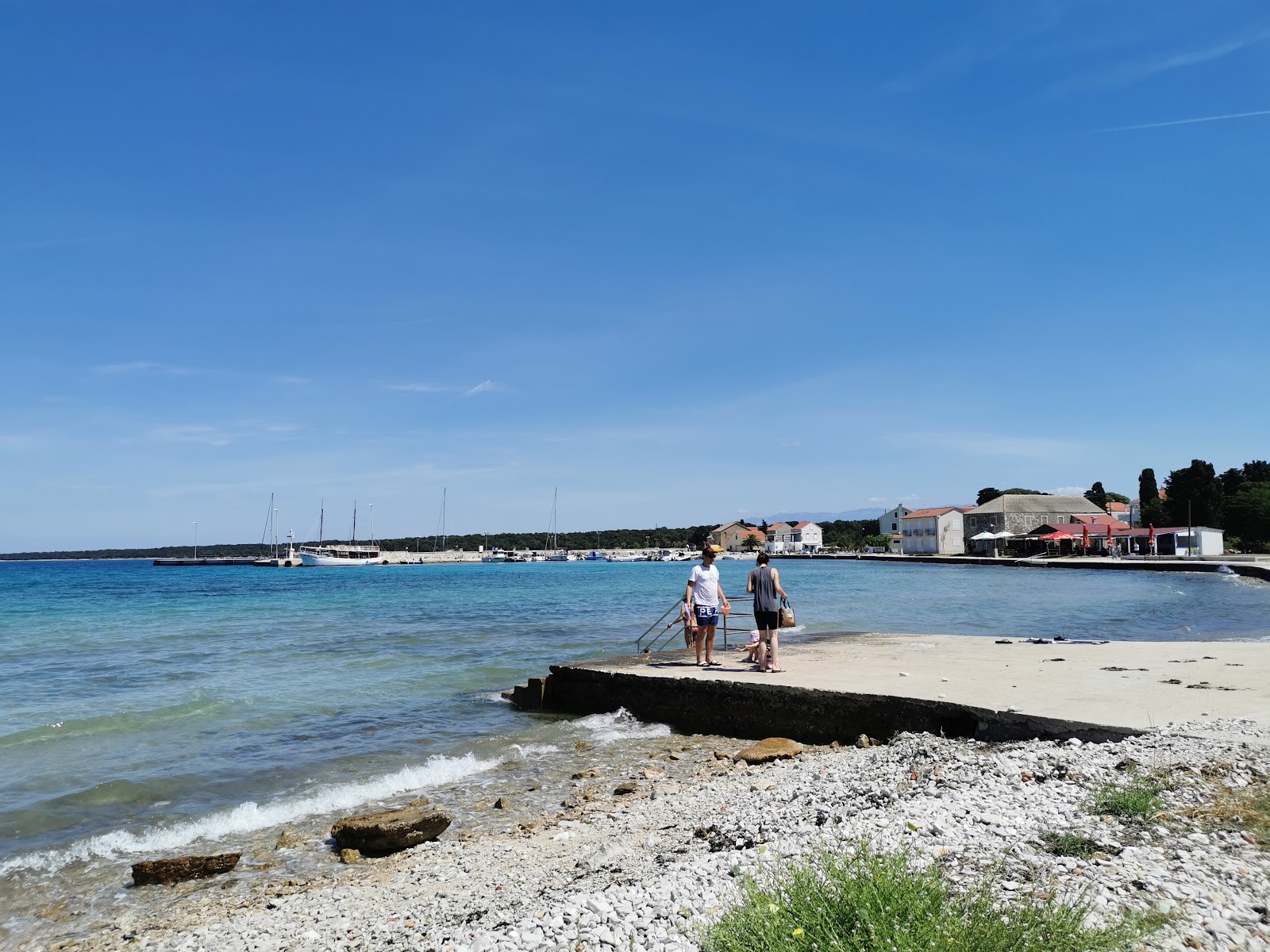 Olib Beach'in fotoğrafı düz ve uzun ile birlikte