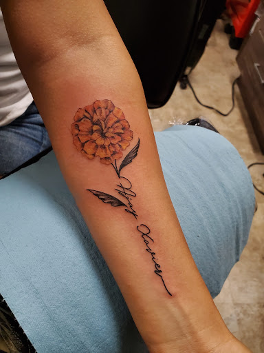 Explore tooled leather tattoo ideas, creative tattoo ideas in Bakersfield, available at CLASSIC STANDARD TATTOO CO.