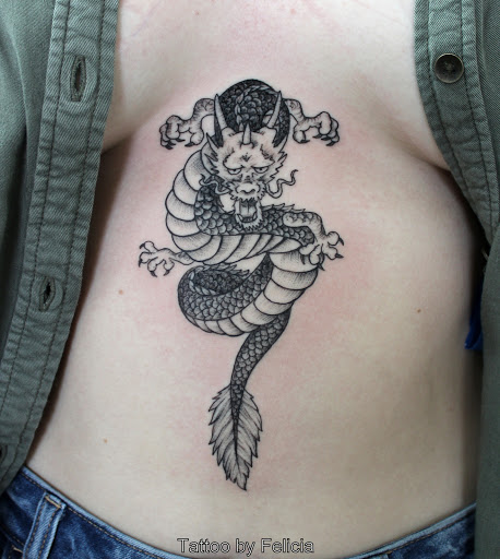 Explore alpha tattoo ideas, creative tattoo ideas in Fort Myers, available at Tiger Lotus Tattoo and Piercing