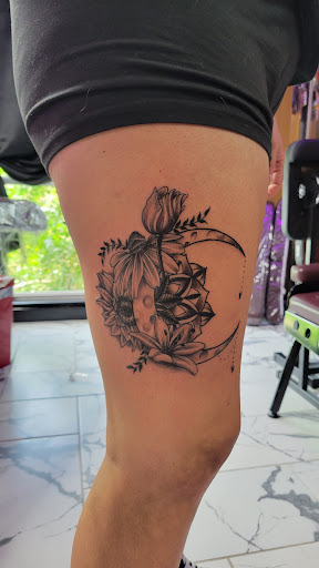 Explore male flower tattoo ideas, creative tattoo ideas in Titusville, available at Exclusive Ink Studio