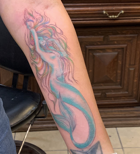 Explore triathlon tattoo ideas, creative tattoo ideas in South Padre Island, available at Seven Sparrows Tattoo