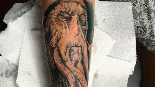 Explore cool meaningful tattoo ideas, creative tattoo ideas in Gainesville, available at Avant Garde TattooNO WALK INSNO PIERCINGSBOOKS FULL
