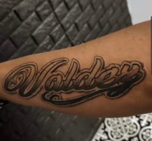 Explore girlfriend name tattoo ideas on chest, creative tattoo ideas in Kenosha, available at Kenosha Tattoo Company