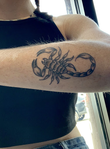 Explore john wayne tattoo ideas, creative tattoo ideas in Venice, available at KISS KISS TATTOO & PIERCING