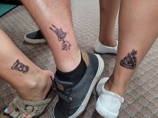 Explore dark knight tattoo ideas, creative tattoo ideas in Angola, available at Hoodlum Ink