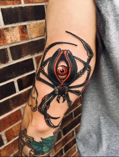 Explore tan tattoo ideas, creative tattoo ideas in Stevens Point, available at Black Rabbit Tattooing