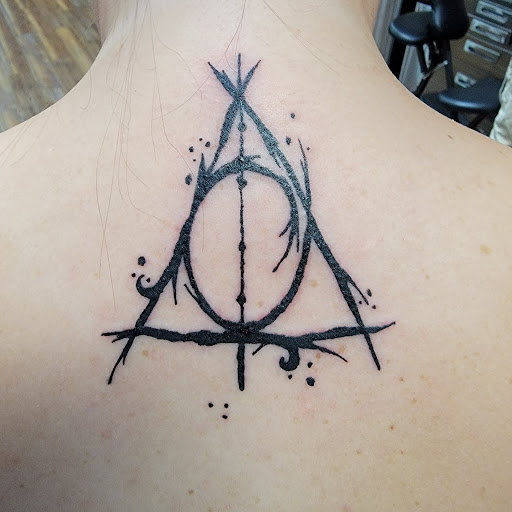 Tattoo Shop «Scratch The Surface Tattoo», reviews and photos, 6550 International Dr #111, Orlando, FL 32819, USA