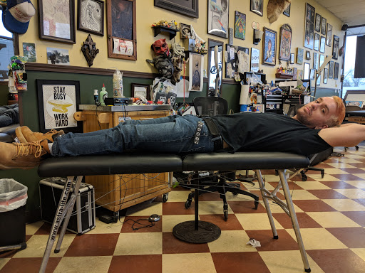 Explore cover up tattoo ideas on hip, creative tattoo ideas in Erie, available at Wayward Tattoo Studio