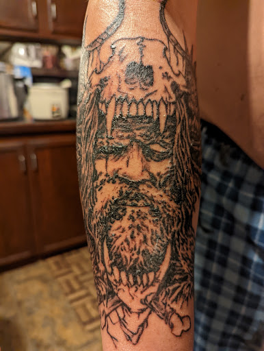 Explore mens arm tattoo ideas small, creative tattoo ideas in Titusville, available at Beatty Switchblade 347 Tattoo
