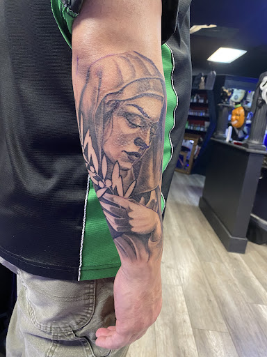 Explore hustler tattoo ideas, creative tattoo ideas in Blue Springs, available at Triple Black Tattoo Studio