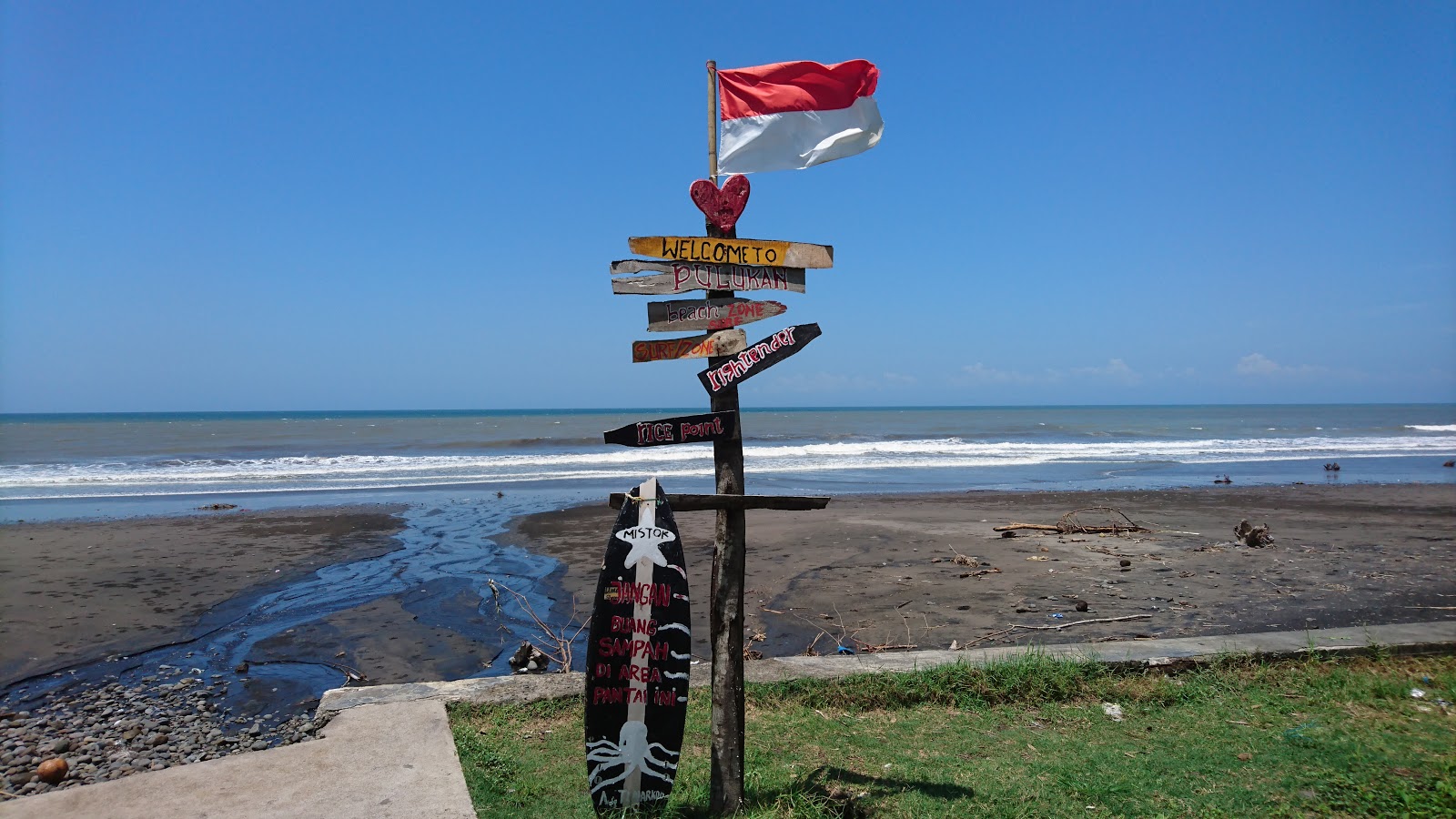 Foto di Pangkung Jukung Beach con una superficie del sabbia marrone