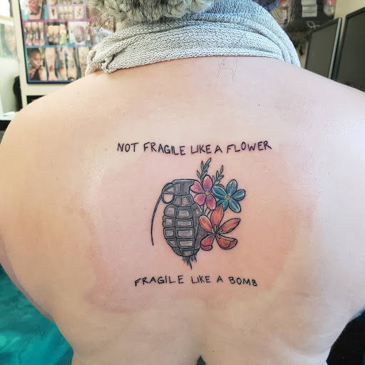 Explore tattoo photography ideas, creative tattoo ideas in Traverse City, available at Pinups & Needles