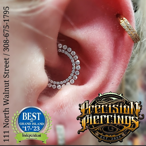 Explore back tattoos for women ideas, creative tattoo ideas in Grand Island, available at Precision Piercings