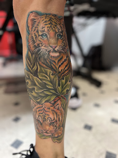 Explore pitbull tattoo ideas, creative tattoo ideas in Foley, available at Black Sheep Custom Tattoos and Piercings