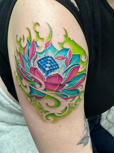 Explore jade tattoo ideas, creative tattoo ideas in Youngstown, available at Twisted Metal Custom Body Art