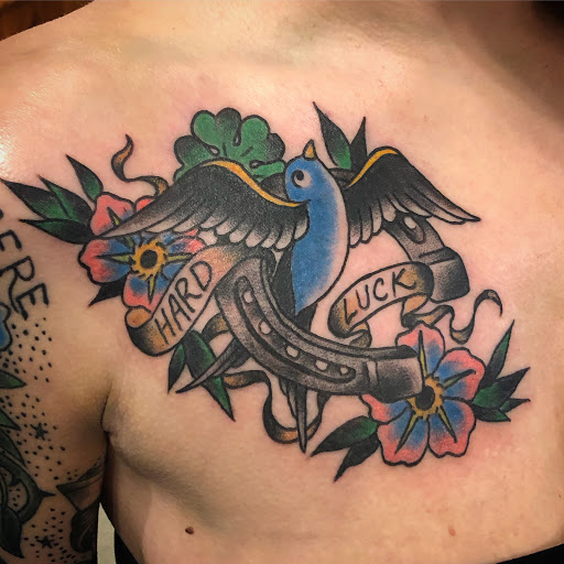 Explore mother son tattoos ideas, creative tattoo ideas in Black River Falls, available at Black River Tattoo