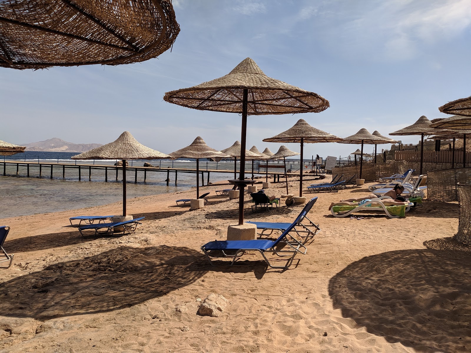 Foto van Tamra Beach met turquoise puur water oppervlakte