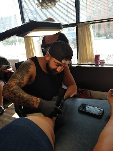 Explore hand tattoo ideas for woman, creative tattoo ideas in Peoria, available at Mixed Personalities Tattoo Studio