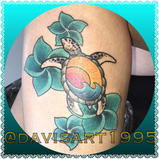 Explore gun tattoo ideas for men, creative tattoo ideas in Cheyenne, available at The T.R.I.B.E. Zoo, LLC Tattoo