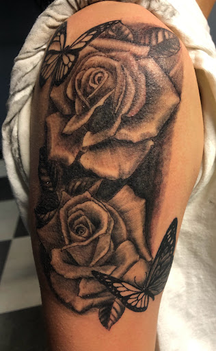 Explore book tattoo ideas for females, creative tattoo ideas in San Angelo, available at A1 Tattoos and Piercings