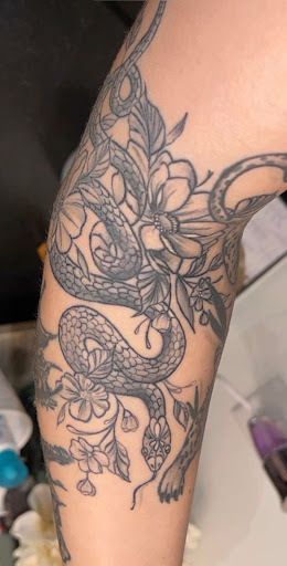 Explore paw print tattoo ideas, creative tattoo ideas in Mayodan, available at Bleeding Ink Tattoo