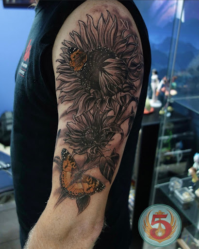 Explore number 9 tattoo ideas, creative tattoo ideas in Lawrence, available at Red 5 Tattoo