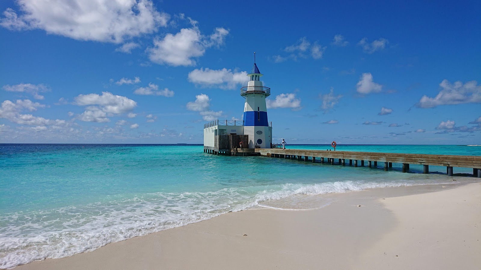 Foto van Collega's Strand met recht en lang