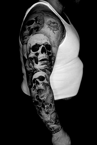 Explore tattoo ideas for wrist for guys, creative tattoo ideas in Norcross, available at Brotherhood Tattoo