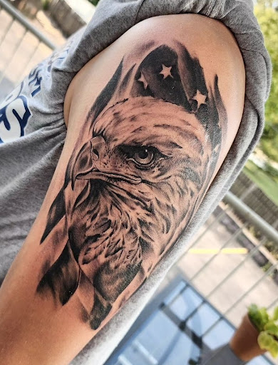 Explore wonder woman tattoo ideas, creative tattoo ideas in Cedar Falls, available at The Iron Quill Tattoo Parlor