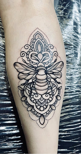 Explore trumpet tattoo ideas, creative tattoo ideas in Lake City, available at Crooked Spines Tattoo Studio